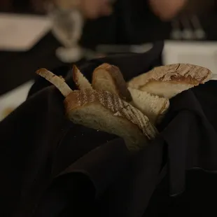 a plate of bread and a glass of wine