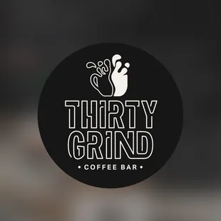 the logo for thirty grind