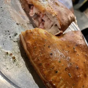 Stromboli with mozzarella, ham, and mushrooms