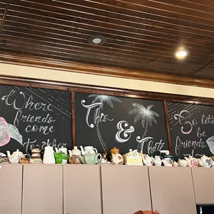 a chalkboard with a variety of items on it