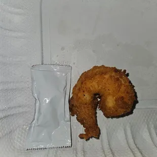 Fried shrimp compared to a ketchup packet