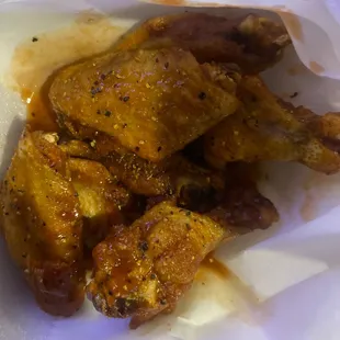 a closeup of the wings in a styrofoam container