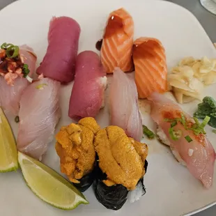Spanish mackerel, salmon, tuna, and uni nigiri
