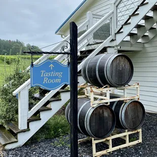 tasting room sign and barrels