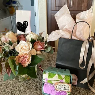 Designers choice floral arrangement &amp; dish towels