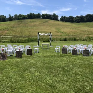 a wedding set up in a field