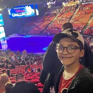 a girl in a mickey mouse hat