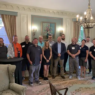 The leadership team on Little Engine Ventures in the parlor.