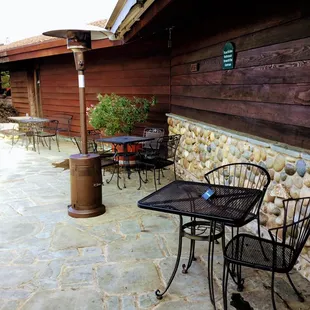 patio area with tables and chairs