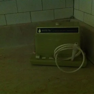 An authentic 1970s WaterPik