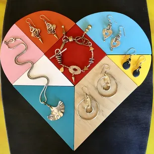 Assortment of hand made jewelry by Thomas Mann, New Orleans, LA.