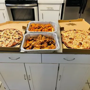 Sausage &amp; Mushroom Pizza/Buffalo Shrimp/Buffalo Wings/Cheese Pizza. BIG food for small gathering.