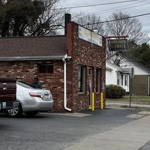 a car parked in front of a restaurant