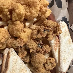 Fried shrimp and oysters with toasted sandwich bread