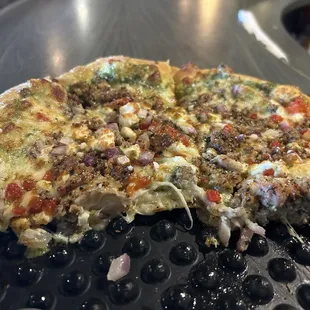 What&apos;s left of my Dani pizza.  Yumx4