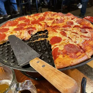 large pepperoni pizza with butter garlic crust
