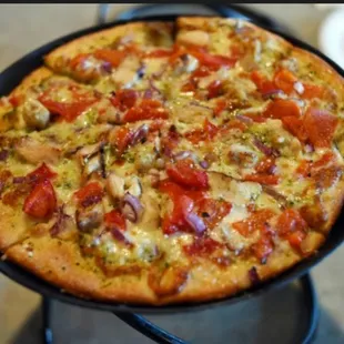 Chicken pesto with red peppers and red onions. Yum!