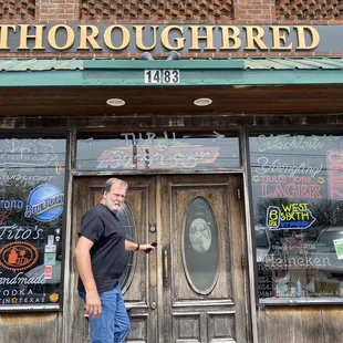 a man standing in front of the door
