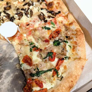 This is pizza on ecstacy. It's just a slice on E. You can't get a more perfect slice of pizza.