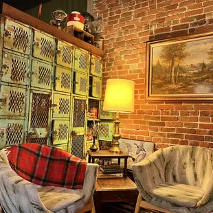 two chairs and a cabinet