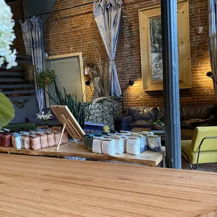 a bar with candles and flowers