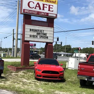 Front sign and overflow parking on the grass - July 2021