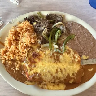 Daily fajita plate with enchiladas, a must try