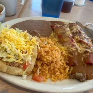Beef enchiladas with a chicken puffy taco
