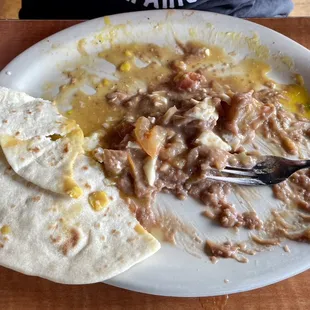 Huevos Rancheros plate.  Sauce on the side.  Yes, she ate it all!!