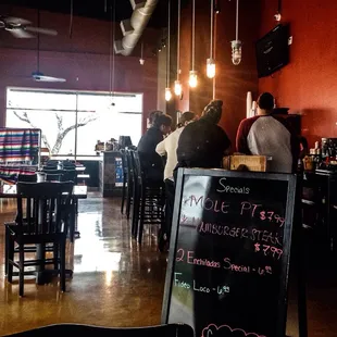 4p on a slow Saturday. Couldn't get service while they sat at the bar and talked.  See Photo: There are SEVEN employees in this picture.