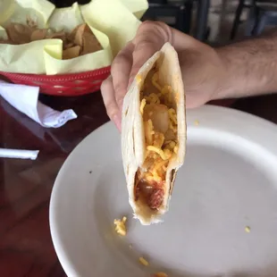 Country sausage, potato, cheese taco