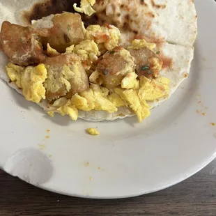 Rubbery eggs, flavorless taco