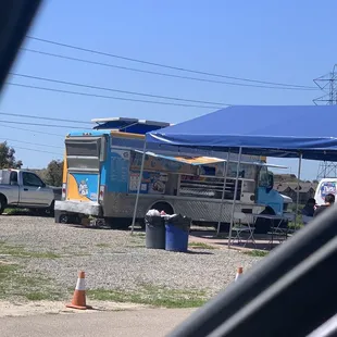 a food truck parked in a parking lot