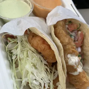 Fish and shrimp tacos. Don&apos;t sleep on those sauces.