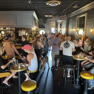 a large group of people sitting at tables