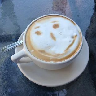 A happy double cappuccino