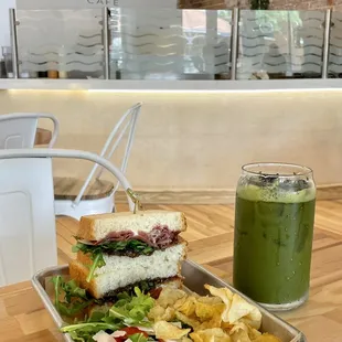 Prosciutto and Brie sandwich with Fig + Butterfly Pea Flower Matcha Lemonade