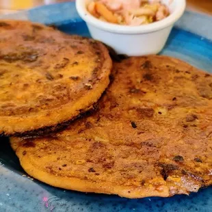 Papusas-potato,ham, and cheese on one and carne asada, cheese, and, beans on the other. The ham one was our favorite.