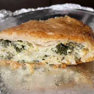 Cross section of spinach and cheese burek.