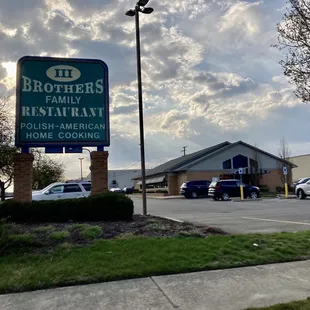two cars parked in a parking lot