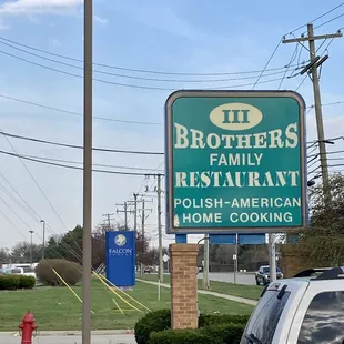 a car parked in front of the restaurant