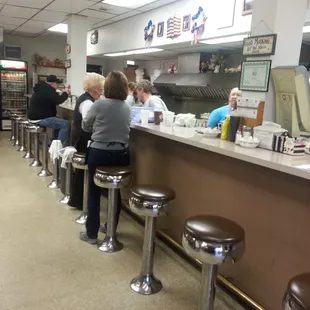 customers sitting at the counter