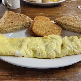 Ham and cheese omelette, wheat toast &amp; hash browns.