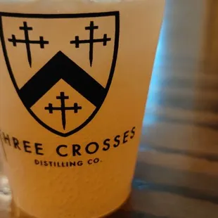 a glass of beer on a table