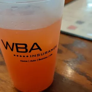 a drink in a plastic cup