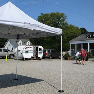 a group of people under a tent