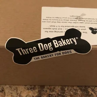 Company Logo, with tips on how to feed a dog.
