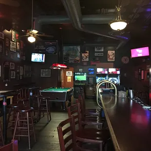 a bar with a pool table