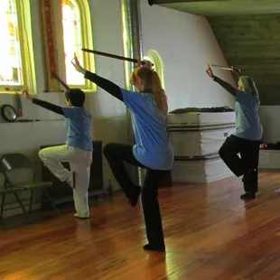 Tai Chi Students performing Salute to the Sun.