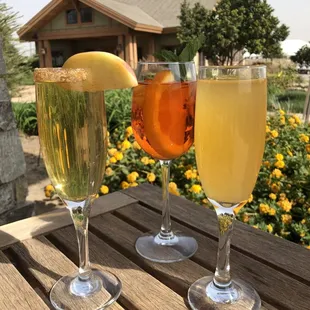 two glasses of wine on a table